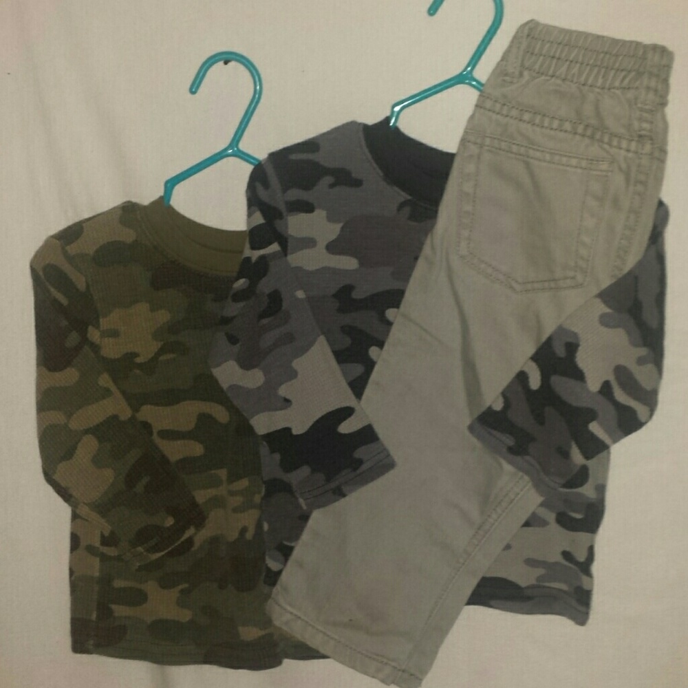 Boys pants with two matching shirts.